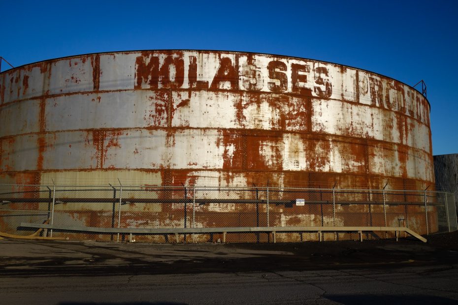 Photo of an old bulk molasses sugar tank.